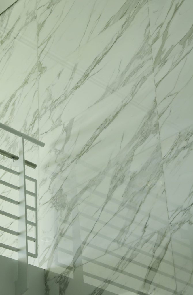 going-green-detail-of-marble-wall-with-parallel-s-2026-03-26-08-08-04-utc
