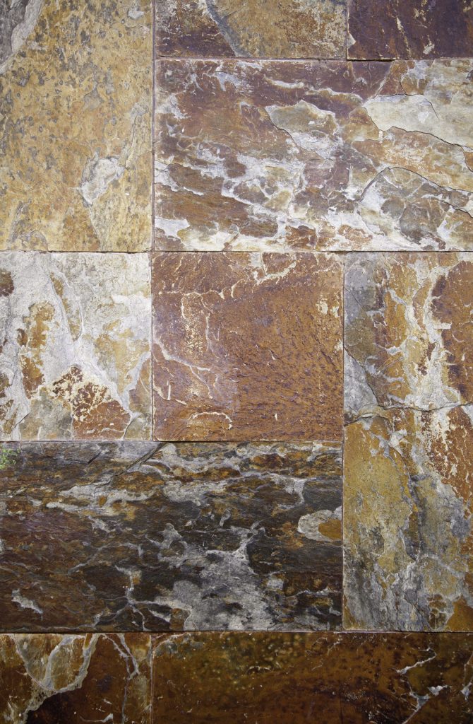 rusty-stone-wall-detail-of-a-wall-of-stone-tiles-2026-01-09-15-02-41-utc